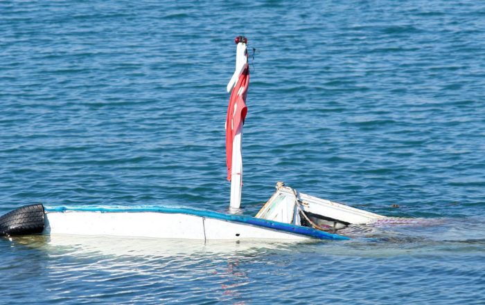 Boat sinking in the ocean